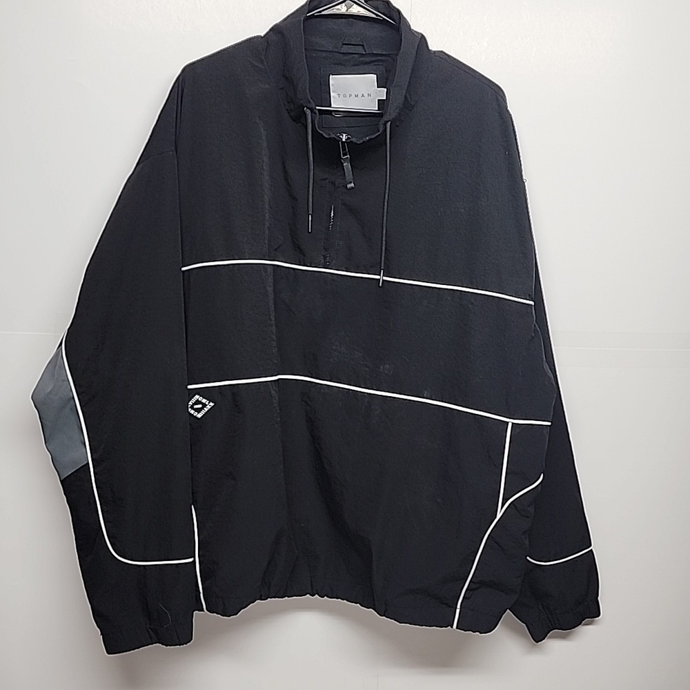 Topman XL piped black track jacket.  Drawstring neck w/zipper & zippered pockets